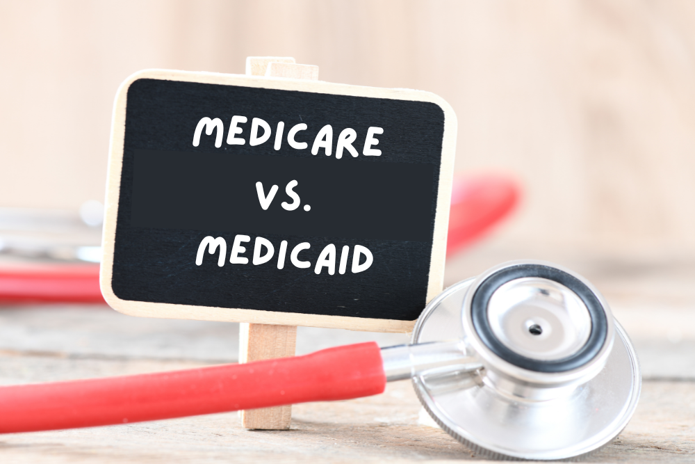 Medicare vs Medicaid on black sign with stethoscope