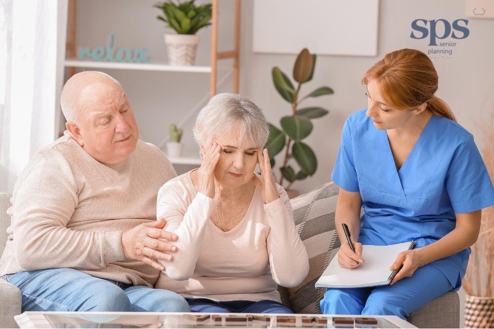 An older woman sits on a couch looking confused, as if she’s forgotten something — representing early onset Alzheimer’s. Senior Planning Services helps families navigate care and support options.