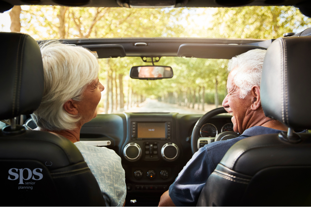 Senior driving a car with focus and care, highlighting the importance of safe driving conversations and support from Senior Planning Services.