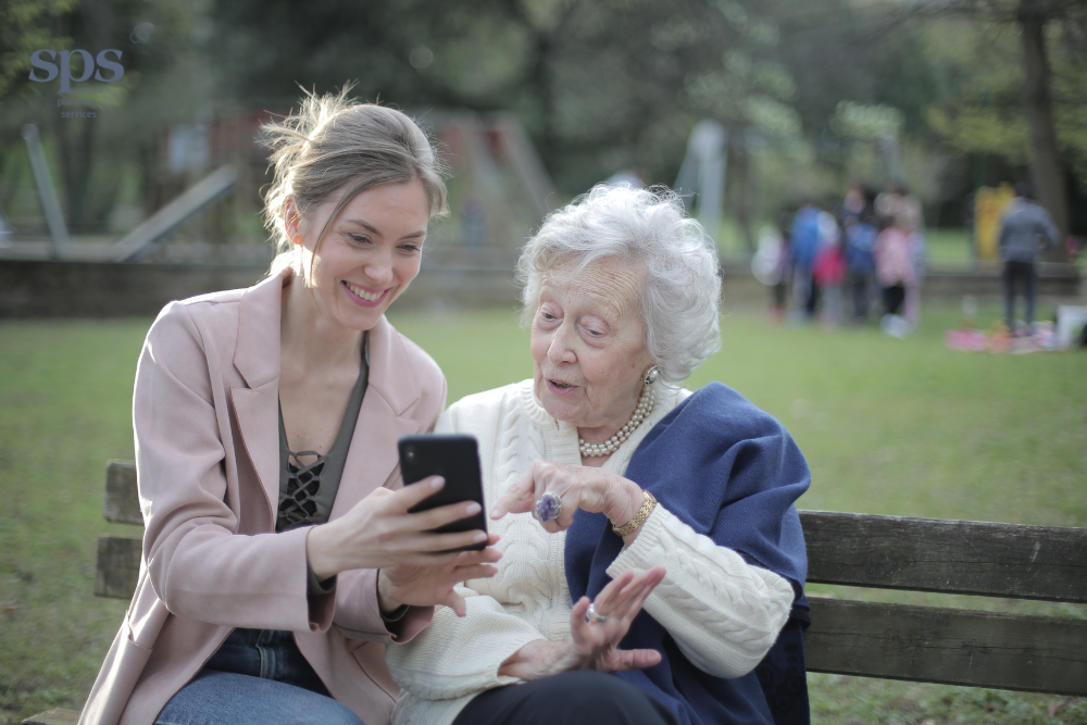 Elderly woman with Alzheimer's sitting on a bench - Senior Planning Services 